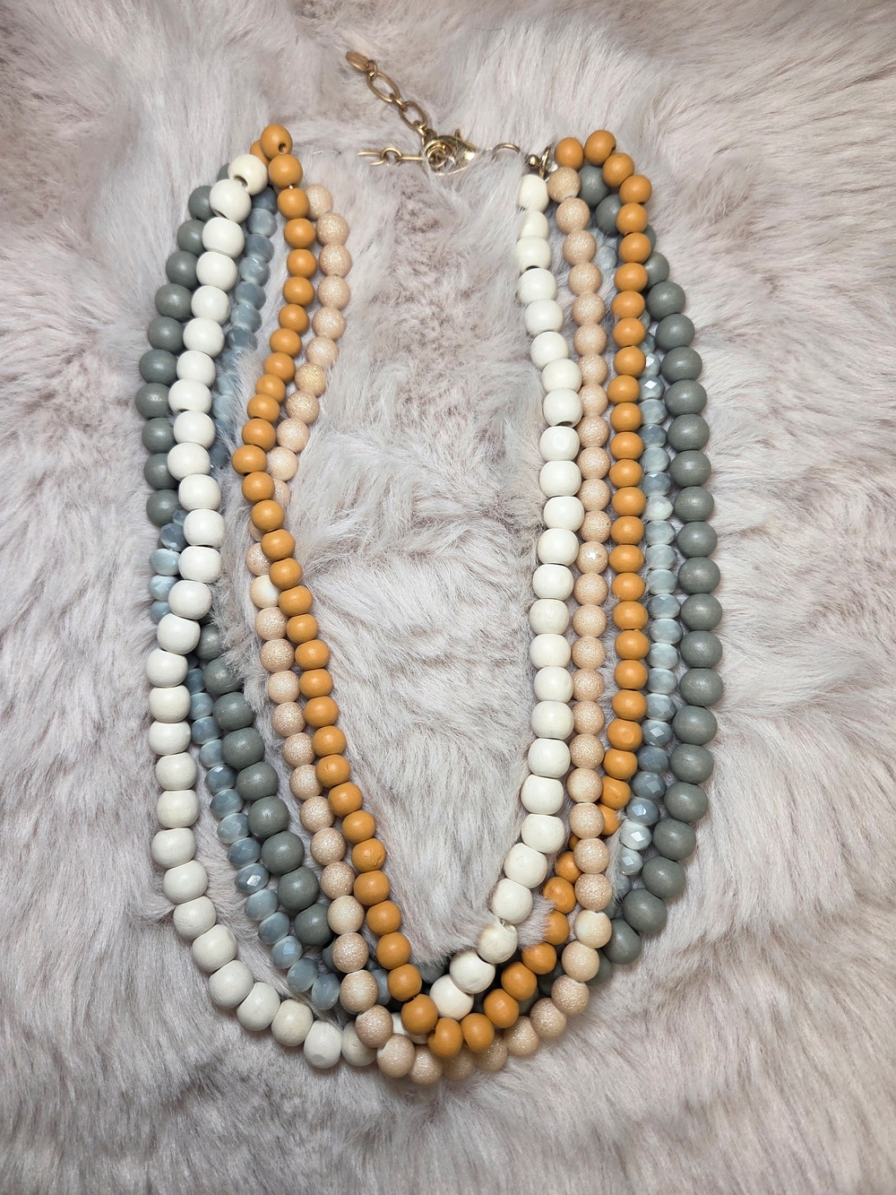 Multi-Strand Beaded Necklace in White, Gray, Blue, and Mustard